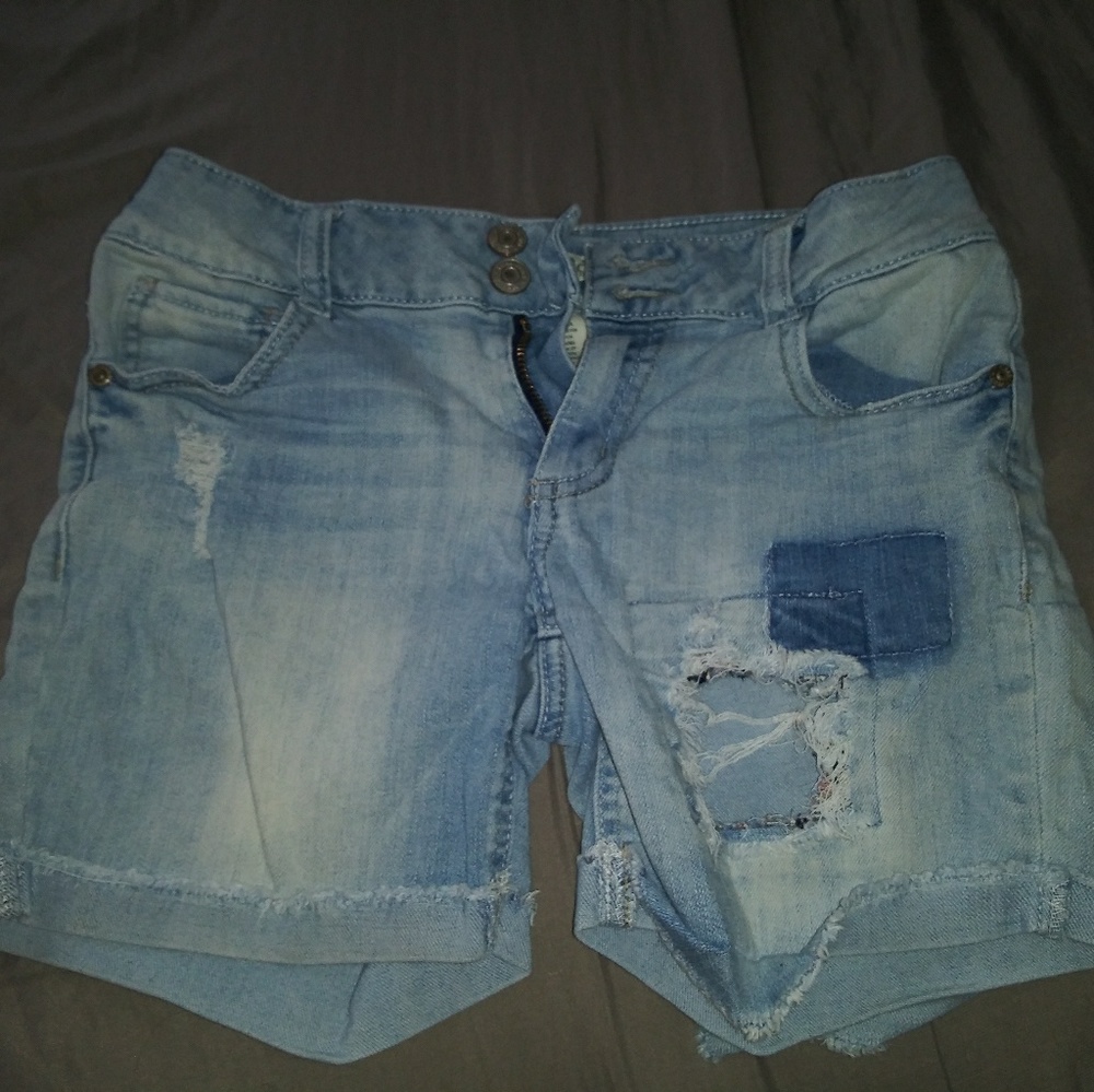 Blue jean ripped shorts